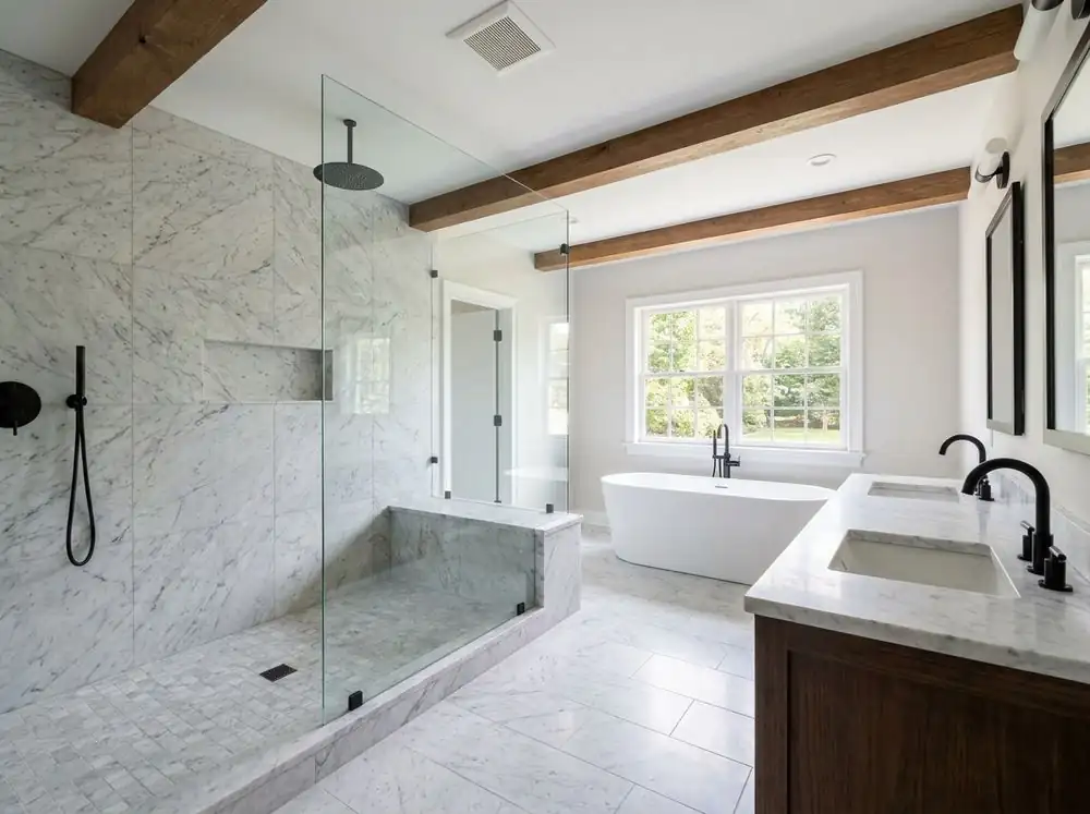 Finished master bathroom with a walk-in shower and freestanding tub (example)