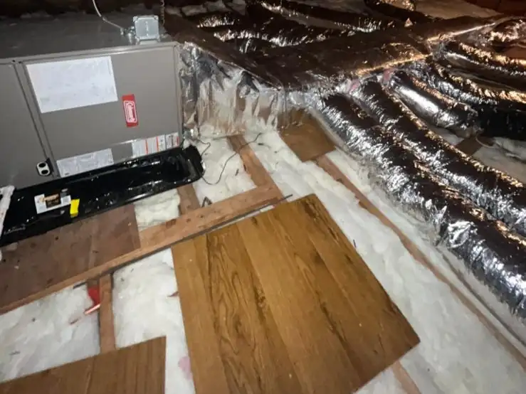 An attic air handler and insulated ductwork we installed